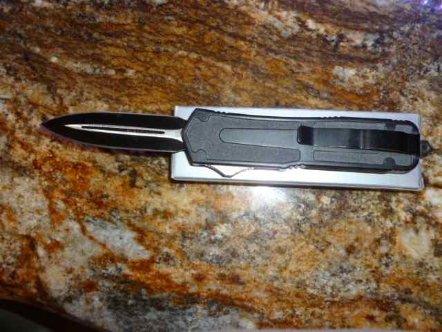 OTF auto knife